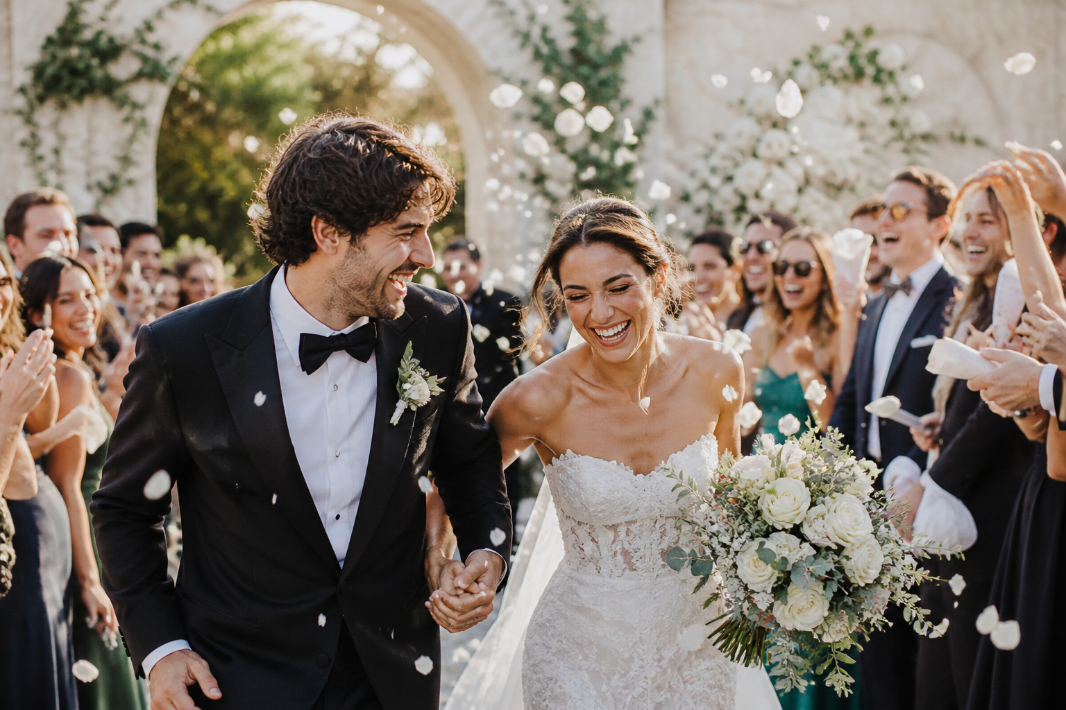 A joyful confetti exit surrounded by guests.