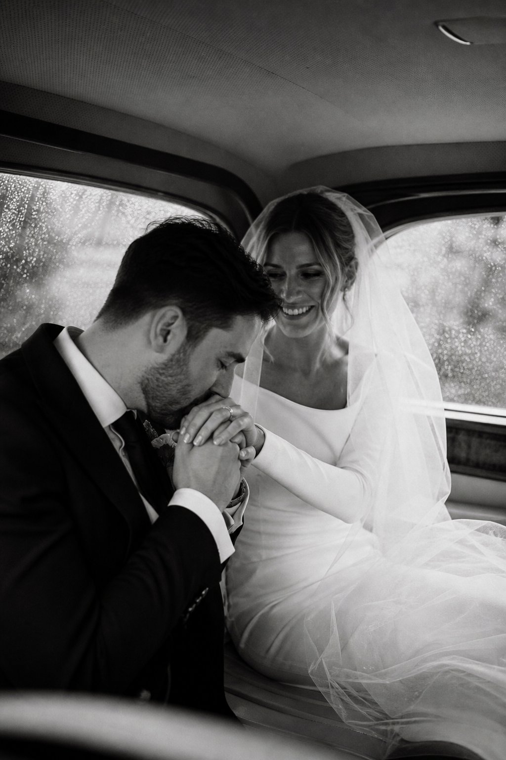 A quiet black and white moment in the car.