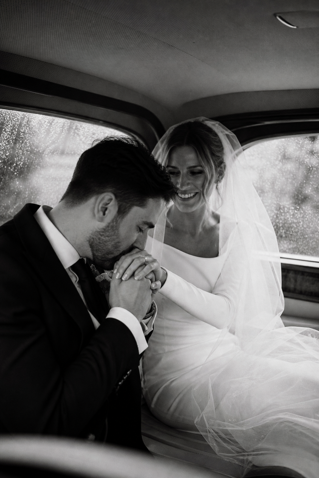 A quiet black and white moment in the car.